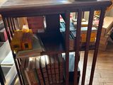 a small table with books on it in a room
