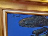 a picture of a painting on the wall of a room