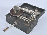 a black box with a silver object inside of it