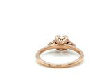 a close up of a diamond ring on a white background