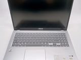 the asus laptop is open and ready to be used