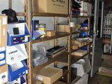 a room filled with lots of boxes and shelves