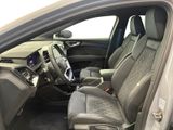 the interior of a car with the front seats folded down