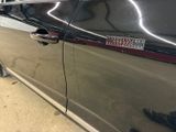 a car that has a sticker on the side of it
