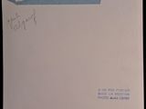 an old envelope with a handwritten message on the front of it