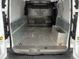 a white van with the door open on a sunny day