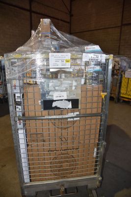 a cart with a lot of boxes on it in a warehouse