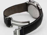 an image of a close up of a watch on a white surface