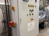 a machine that is sitting inside of a building
