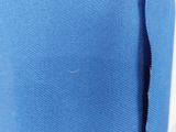 a piece of fabric that has been torn off of it
