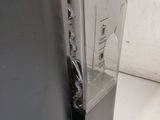 a broken door handle on the side of a refrigerator