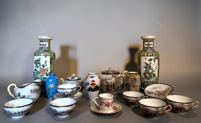 many different types of vases and bowls on the table