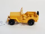 a yellow toy jeep with a tag attached to it