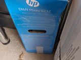 a box that is sitting on the floor next to a laptop