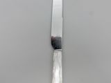 a knife that is sitting on top of a table