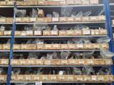 many boxes of items on the shelves in the warehouse