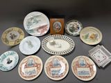 many plates and bowls that are on a table