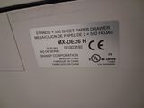 a close up of a sign on a refrigerator