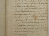 a close up of an open book with writing on it