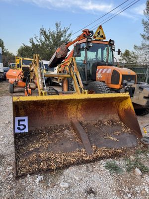 a bulldozer that is sitting in the dirt