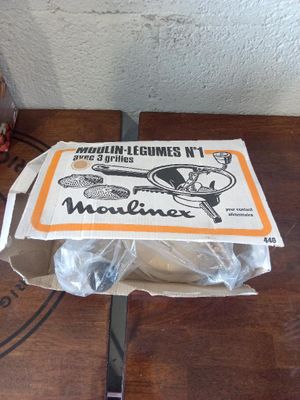 a cake that is sitting on a table with a pair of scissors
