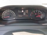 a close up of a car dashboard with a speedometer and gauges