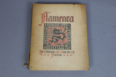 an old book with a picture of a dragon on it