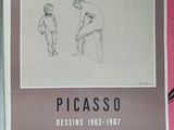 posters on the wall of a building in paris, france