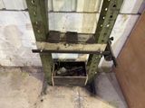 a picture of a metal work bench with a hole in the floor