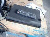 a remote control sitting on top of a box