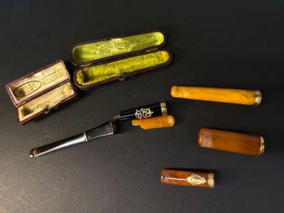 a few different types of pipe in a case