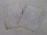 two pieces of cloth on the table next to each other
