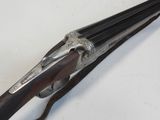 an old gun that is laying on top of a table