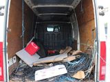 the back of a van with a bunch of wires in the back
