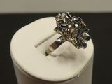 a ring that is sitting on top of a white box