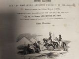 an old book with a picture of a man on a horse