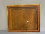 an old wooden picture frame with a picture of a bird on it