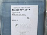 a plastic container with a label on it sitting on a table