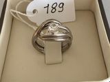 an image of a ring in a box with a price tag on it