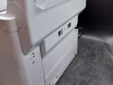 a printer that is sitting on top of a box