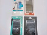 three packages of cell phones sitting on a table