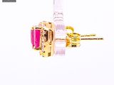 a pair of pink and gold earrings on a white background
