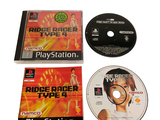 a video game on the table next to a cd