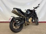 a picture of a motorcycle parked in a garage