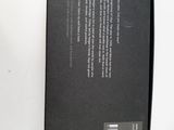 the back of a black box on a white surface