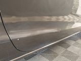a close up of a car ' s door handle on the side of the car