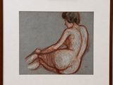 dessin représentant une femme nue assise à genoux, dans un cadre marron