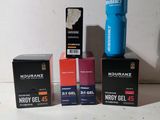 three boxes of nutrazz energy gels and a bottle of nutrazz energy gel