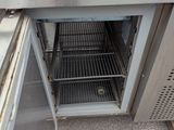 an image of an open refrigerator with a door open