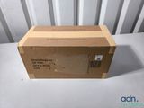 an empty box sitting on top of a white table